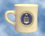 Air Force Coffee Mugs These heavy duty 8 oz. coffee mugs are made of vitreous china and are dish washer safe.  DO NOT MICROWAVE... 
 The mugs are imported from China as a plain mug, then the custom  designs are fired up in the kilns of our manufacturer's plant in New Hampshire



sorry- cannot ship mugs outside of the US.....


See below for details and pictures   Please note, if a mug is not in stock, and we have to order it from the manufacturer, there is a 4 week delay, and a shipping surcharge TBD. If you have a critical delivery date for your mug(e.g.holiday gift) please e-mail Mystic Army Navy for availability:       sales@mysticarmynavy.com 